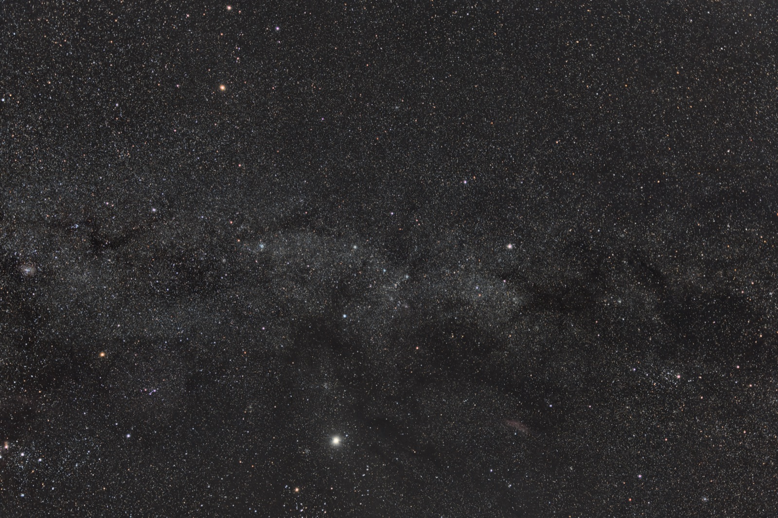 Winter Milky Way with Orion, red nebulae and two bright planets in a wide star field